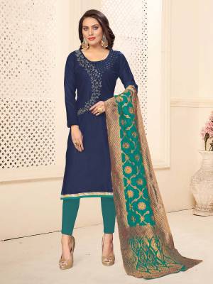 If Those Readymade Suit Does Not Lend You The Desired Comfort, Than Grab This Dress Material In Navy Blue And Sea Green color And Get This Stitched As Per Your Desired Fit And Comfort. Its Top And Bottom are Cotton Based Paired With Banarasi Silk Dupatta. 