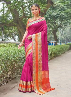 Shine Bright In This Pretty Designer Silk Based Saree In Dark Pink Color Paired With Contrasting Orange Colored Blouse. This Saree And blouse Are Fabricated On Handloom Silk Beautified With Weave And Embroidery. Buy This Lovely Saree Now.