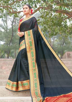 Celebrate This Wedding Season In A Proper Traditional Look Wearing This Lovely Saree In Black Color Paired With Contrasting Red Colored Blouse. This Saree And Blouse Are Fabricated On Handloom Silk Beautified With Weave And Embroidered Blouse. Buy Now.