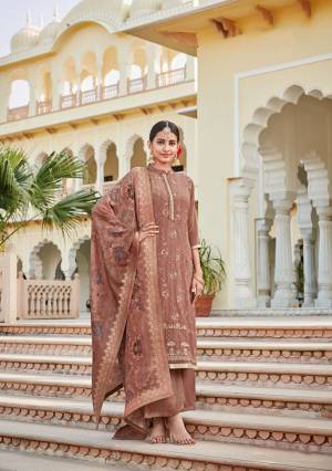 Flaunt Your Rich And Elegant Taste Wearing This Heavy Designer Straight Suit In Light Brown Color. Its Embroidered Top Is Crepe Based Paired With Soft Silk Bottom And Jacquard Silk Fabricated Dupatta. Its Fabrics Are Soft Towards Skin And Easy To Carry All Day Long. 