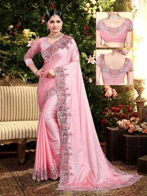 Flaunt Your Rich and Elegant Taste Wearing This Designer Saree In Baby Pink Color. This Saree Is Fabricated On Satin Georgette Paired With Art Silk Fabricated Blouse. It Is Beautified With Elegant Heavy Embroidered Lace Border. Buy Now.