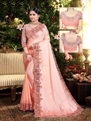 Flaunt Your Rich and Elegant Taste Wearing This Designer Saree In Peach Color. This Saree Is Fabricated On Satin Georgette Paired With Art Silk Fabricated Blouse. It Is Beautified With Elegant Heavy Embroidered Lace Border. Buy Now.