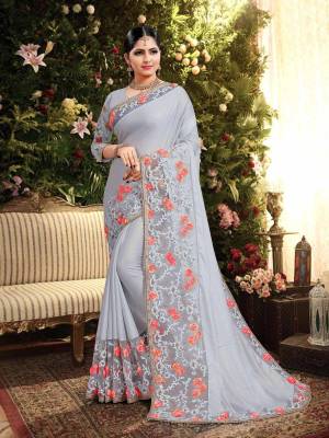 Here Is A Pretty Heavy Designer Saree In Rich Steel Blue Color. This Saree Is Is Butter Silk Based Paired With Art Silk Fabricated Blouse. It Has Attractive Broad Embroidered Lace Border With Contrasting Work. 
