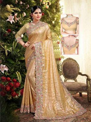 Add This Lovely Saree To Your Wardrobe In Golden Color Paired With Golden Colored Blouse. This Saree Is Fabricated On Fancy Silk Paired With Art Silk Fabricated Blouse. Its Pretty Color Pallete And Designer Look Will Earn You Lots Of Compliments From Onlookers. 