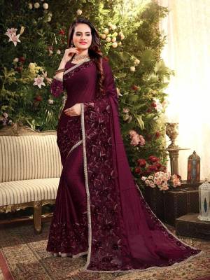Flaunt Your Rich and Elegant Taste Wearing This Designer Saree In Wine Color. This Saree Is Fabricated On Silk Georgette Paired With Art Silk Fabricated Blouse. It Is Beautified With Elegant Heavy Embroidered Lace Border. Buy Now.