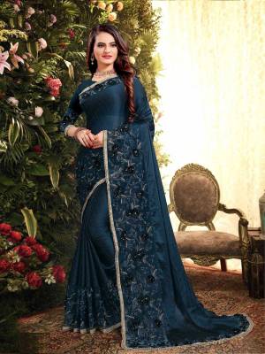 Flaunt Your Rich and Elegant Taste Wearing This Designer Saree In Navy Blue Color. This Saree Is Fabricated On Silk Georgette Paired With Art Silk Fabricated Blouse. It Is Beautified With Elegant Heavy Embroidered Lace Border. Buy Now.