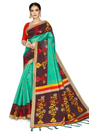 Celebrate This Festive Season With Beauty And Comfort Wearing This Designer Silk Based Saree In Sea Green And Wine Color Paired With Red Colored Blouse. This Pretty Saree And Blouse Are Fabricated On Art Silk Beautified With Heavy Weaved Lace Border. Buy Now.