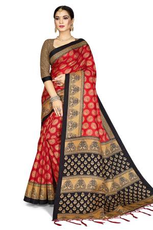 Celebrate This Festive Season With Beauty And Comfort Wearing This Designer Silk Based Saree In Red Color Paired With Black Colored Blouse. This Pretty Saree And Blouse Are Fabricated On Art Silk Beautified With Heavy Weaved Lace Border. Buy Now.