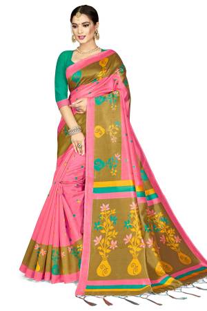 For A Royal Look, Grab This Designer Silk based Saree In Pink Color Paired With Green Colored Blouse. This Saree And Blouse Are Fabricated On Art Silk Beautified With Weaved Lace Border. Buy This Pretty Elegant Saree Now