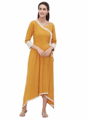 Here Is A Beautiful High Low Patterned Designer Readymade Kurti In Musturd Yellow Color. This Pretty Elegant Kurti Is Fabricated On Rayon Which Is Suitable For This Summer Season. Buy Now.
