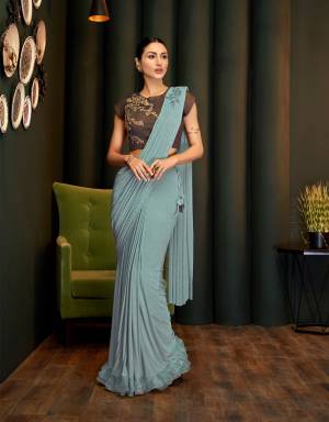 A classy , sophisticated and graceful pick, this saree is a modern take on evergreen outfits. Pair with subtle jewels to complete the look. 