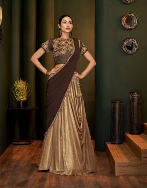 Be a fashionista straight out of a fashion magazine in this cowl-lehenga saree . Wear it in your next festiivity and be the talk of the town. 