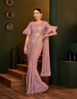 Stylish, sassy and suave , this saree is everything you want to be called as the ultimate fashionista. The dual layer pallu is the key attraction.