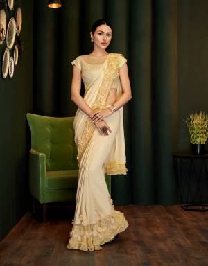 Declare your love for creative and ingenious ethnic wear in this exclusively designed pre-pleated saree and turn heads