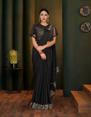 Exude princess like vibes in this uniquely designed ready-to-wear saree with just the right amount of frilly touch and shine like a star in your next soiree. 