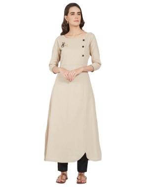 Here Is A Lovely Pair Of Kurti In Cream Color Paired With Black Colored Pants. This Kurti Is Khadi Based Paired With Cotton Fabricated Bottom. 