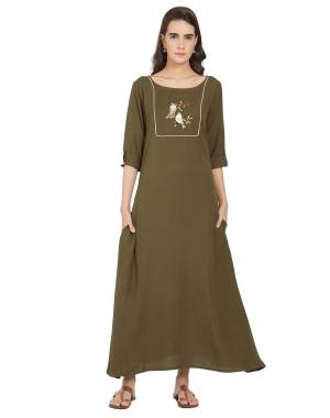 Celebrate This Festive Season With Beauty And Comfort Wearing This Designer Readymade Long Kurti In Olive Green Fabricated On Linen. Its Rich Fabric And Color Will Earn You Lots Of Compliments From Onlookers. 