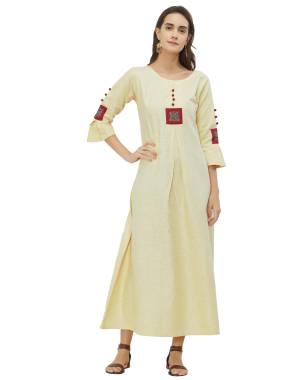 Flaunt Your Rich And Elegant Taste Wearing This Designer Readymade Long Kurti In Light Yellow Color Fabricated On Khadi. 