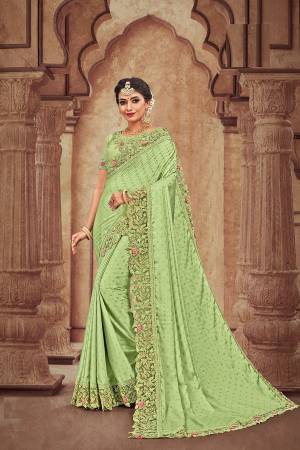 Get Ready For The Upcoming Wedding Season With This Heavy Designer Saree With Heavy Embroidery Fabricated On Satin Georgette. Its Attractive Embroidery And Pretty Color Will Definitely Earn You Lots Of Compliments From Onlookers. 