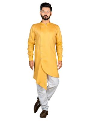 Grab This Amazing Pair Of Kurta And Chudidar For Men Fabricated On Jacquard Silk And Cotton Respectively. This Kurta Is Suitable For Festive Wear Or Any Wedding Functions. It Is Light In Weight and Can Be Paired With Any Kind Of Bottom Like Chudidar, Pyjama Or Even Denims. Its Fabric Is Soft Towards Skin And Avialable In All Sizes. Buy Now.
