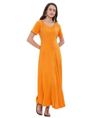 Grab This Beautiful Designer Long Kurti In Musturd Yellow Color. This Readymade Kurti Is Fabricated On Rayon Beautified With Mirror Work. It Is Light Weight And Soft Towards Skin.