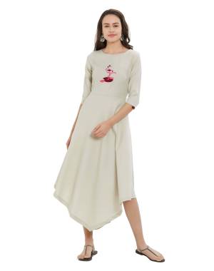 Simple And Elegant Looking Designer Readymade Kurti Is Here In Off-White Color Fabricated On Rayon Slub Beautified With Thread Work. 