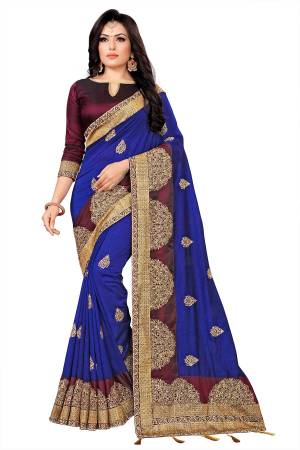 Look Attractive In This Pretty Embroidered Designer Saree In Royal Blue Color Paired With Wine colored Blouse. This Saree Is Silk Based Paired With Tafeta Art Silk Fabricated Blouse. 