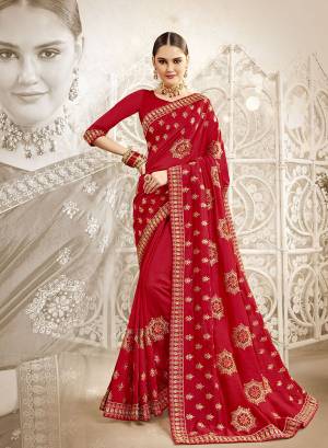Look Attractive In This Beautiful Designer Saree In Red Color. This Saree And Blouse Are Silk Based Beautified With Pretty Embroidery Work. Buy Now.