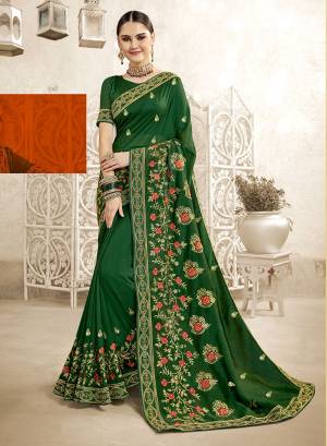 Look Attractive In This Beautiful Designer Saree In Dark Green Color. This Saree And Blouse Are Silk Based Beautified With Pretty Embroidery Work. Buy Now.