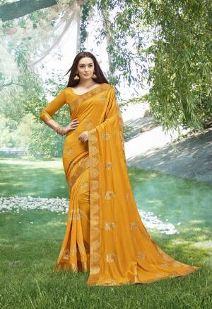 Look Pretty In This Designer Elegant Looking Ssaree In Musturd Yellow Color. This Saree Is Fabricated On Soft Art Silk Beautified With Detailed Jari Embroidery With Stone Work Paired With Art Silk Fabricated Blouse. 