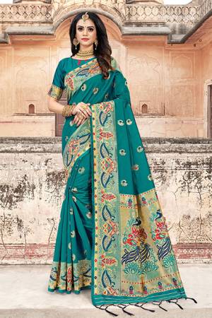 Pretty Simple And Elegant Looking Saree Is Here In Teal Blue Color. This Saree And Blouse Are Fabricated On Art Silk Beautified With Weave. It Is Light In Weight And Easy To Carry All Day Long. 