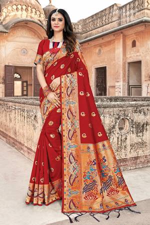 Here Is A Royal Looking Silk Based Designer Saree In Red Color. This Saree And Blouse Are Fabricated On Art Silk Beautified With Weave. Buy Now.