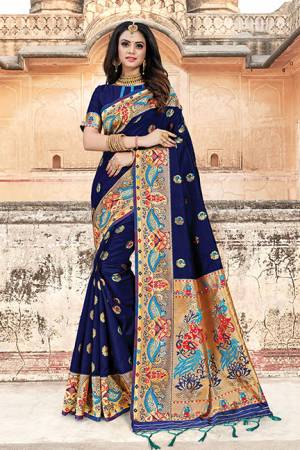 Pretty Simple And Elegant Looking Saree Is Here In Navy Blue Color. This Saree And Blouse Are Fabricated On Art Silk Beautified With Weave. It Is Light In Weight And Easy To Carry All Day Long. 