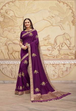 Add This Pretty Piece To Your Wardrobe With This Designer Saree In Purple Color. This Saree And blouse Are Silk Based Beautified With Embroidered Motifs And Weave Lace Border.
