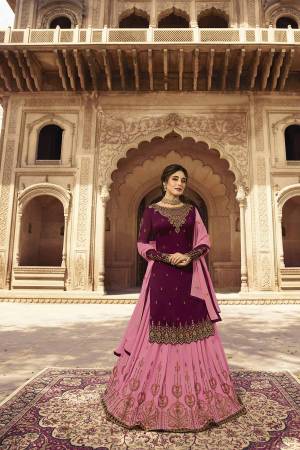 Grab This Very Beautiful Two In One Designer Lehenga Suit Which Comes With Two Bottoms. This Pretty Suit Is In Wine Colored Top And Bottom Paired With Pink Colored Lehenga And Dupatta. Its Embroidered Top, Lehenga And Dupatta Are Fabricated On Georgette Paired With Santoon Fabricated Bottom. Buy Now.