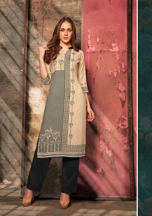 For Your Casual Or Semi-Casual Wear This Summer, Grab This Readymade Kurti With Pants. This Kurti Is Fabricated On Rayon Beautified With Digital Prints Paired With Cotton Fabricated Bottom. Buy Now. 