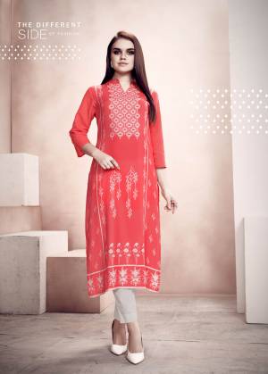 Here Is A Pretty Simple Readymade Kurti For Your Casual Wear In Red Color. This Kurti Is Fabricated on Rayon Beautified With Prints. It Is Light Weight, Soft Towards Skin And Easy To Carry All Day Long. Also You Can Pair This Up Same Or Contrasting Colored Leggings or Pants. 