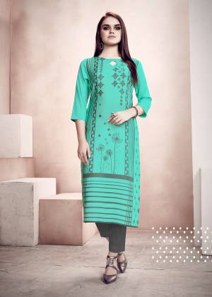 Grab this Amazing Comfy Kurti In Sea Green Color Fabricated On Rayon. It Is Beautified With Prints And Can Be Paired With Leggings, Pants Or Plazzo. Grab This Lovely Summer Perfect Kurti. 