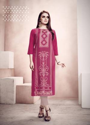 Here Is A Pretty Simple Readymade Kurti For Your Casual Wear In Magenta Pink Color. This Kurti Is Fabricated on Rayon Beautified With Prints. It Is Light Weight, Soft Towards Skin And Easy To Carry All Day Long. Also You Can Pair This Up Same Or Contrasting Colored Leggings or Pants. 