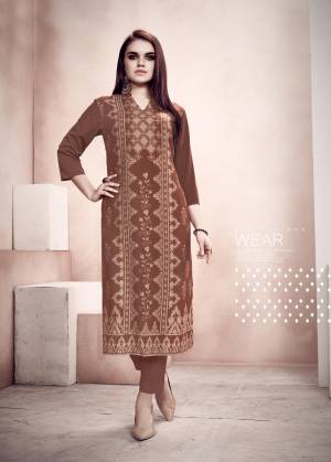 Grab this Amazing Comfy Kurti In Brown Color Fabricated On Rayon. It Is Beautified With Prints And Can Be Paired With Leggings, Pants Or Plazzo. Grab This Lovely Summer Perfect Kurti. 