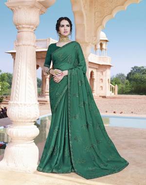 Enhance Your Personality Wearing This Designer Saree In Sea Green Color. This Pretty Tone To Tone Embroidered Saree Is Fabricated On Chinon Paired With Art Silk Fabricated Blouse. Also It Is Light Weight And easy To Drape. 