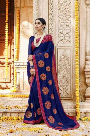 Enhance Your Personality Wearing This Attractive Looking Designer Saree In Royal Blue Color. This Saree Is Silk Georgette Based Paired With Art Silk Fabricated Blouse. It Is Light Weight And Easy To Carry All Day Long. 