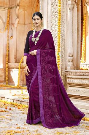 Grab This Beautiful Purple Colored Designer Saree Paired With Dark Purple Colored Blouse. This Saree Is Fabricated On Silk Georgette Paired With Art Silk Fabricated Blouse. Buy This Pretty Tone To Tone Embroidered Saree Now.