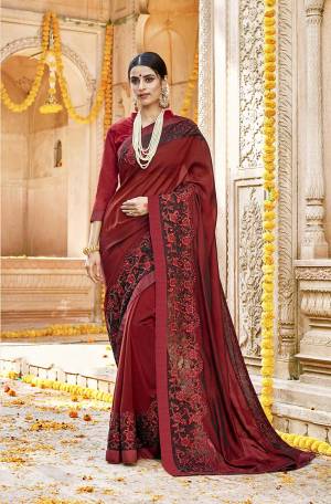Enhance Your Personality Wearing This Attractive Looking Designer Saree In Maroon Color. This Saree Is Silk Georgette Based Paired With Art Silk Fabricated Blouse. It Is Light Weight And Easy To Carry All Day Long. 