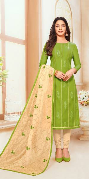Get This Pretty Designer Semi-Stitched Suit In Green Colored Top Paired With Cream Colored Bottom And Dupatta. Its Top And Dupatta Are Fabricated On Modal Silk Paired With Cotton Based Bottom. Buy Now.