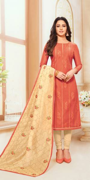 Get This Pretty Designer Semi-Stitched Suit In Rust Red Colored Top Paired With Cream Colored Bottom And Dupatta. Its Top And Dupatta Are Fabricated On Modal Silk Paired With Cotton Based Bottom. Buy Now.