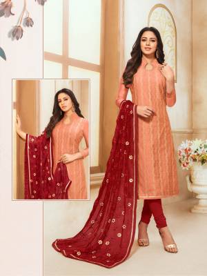 For Your Semi-Casual Wear, Grab This Designer Straight Suit In Peach Colored Top Paired With Red Colored Bottom And Dupatta. Its Embroidered Top Is Fabricated On Modal Silk Paired Cotton Bottom And Chiffon Fabricated Embroidered Dupatta.
