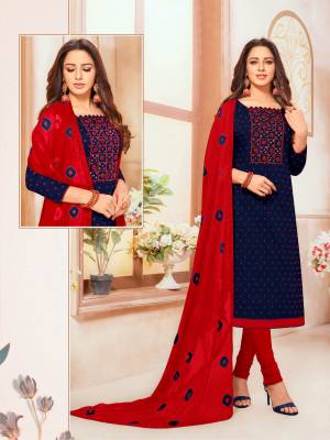 For Your Semi-Casual Wear, Grab This Designer Straight Suit In Navy Blue Colored Top Paired With Red Colored Bottom And Dupatta. Its Embroidered Top Is Fabricated On South Cotton Paired Cotton Bottom And Chiffon Fabricated Embroidered Dupatta.