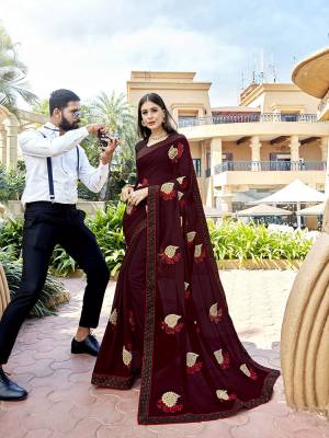 Shine Bright Wearing This Lovely Designer Saree In Maroon Color Paired With Maroon Colored Blouse. This Pretty Saree Is Silk Georgette Based Paired With Art Silk Fabricated Blouse. It Is Beautified With Detailed Attractive Embroidery. Buy Now.