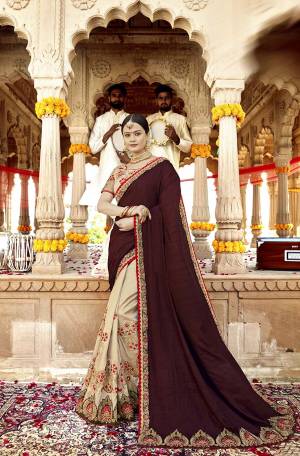 Flaunt Your Rich And Elegant Taste Wearing This Brown Colored Designer Saree. This Saree And Blouse Are Silk Based Which Also Gives A Rich Look To Your Personality. 